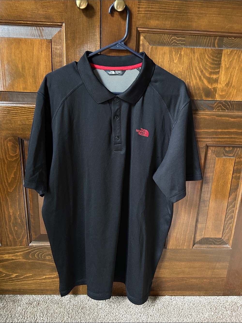 The North Face Black Polo with Red Logo Accent